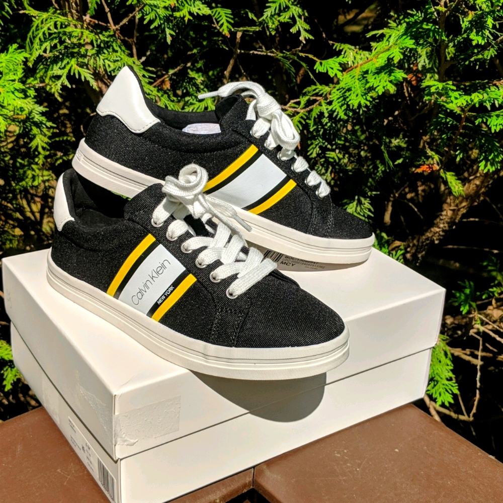 Calvin Klein Women's Black Sneakers with Yellow Stripe